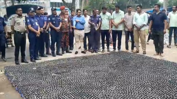 নওগাঁয় ১৬ হাজার ৬১ বোতল ফেন্সিডিল ধ্বংস